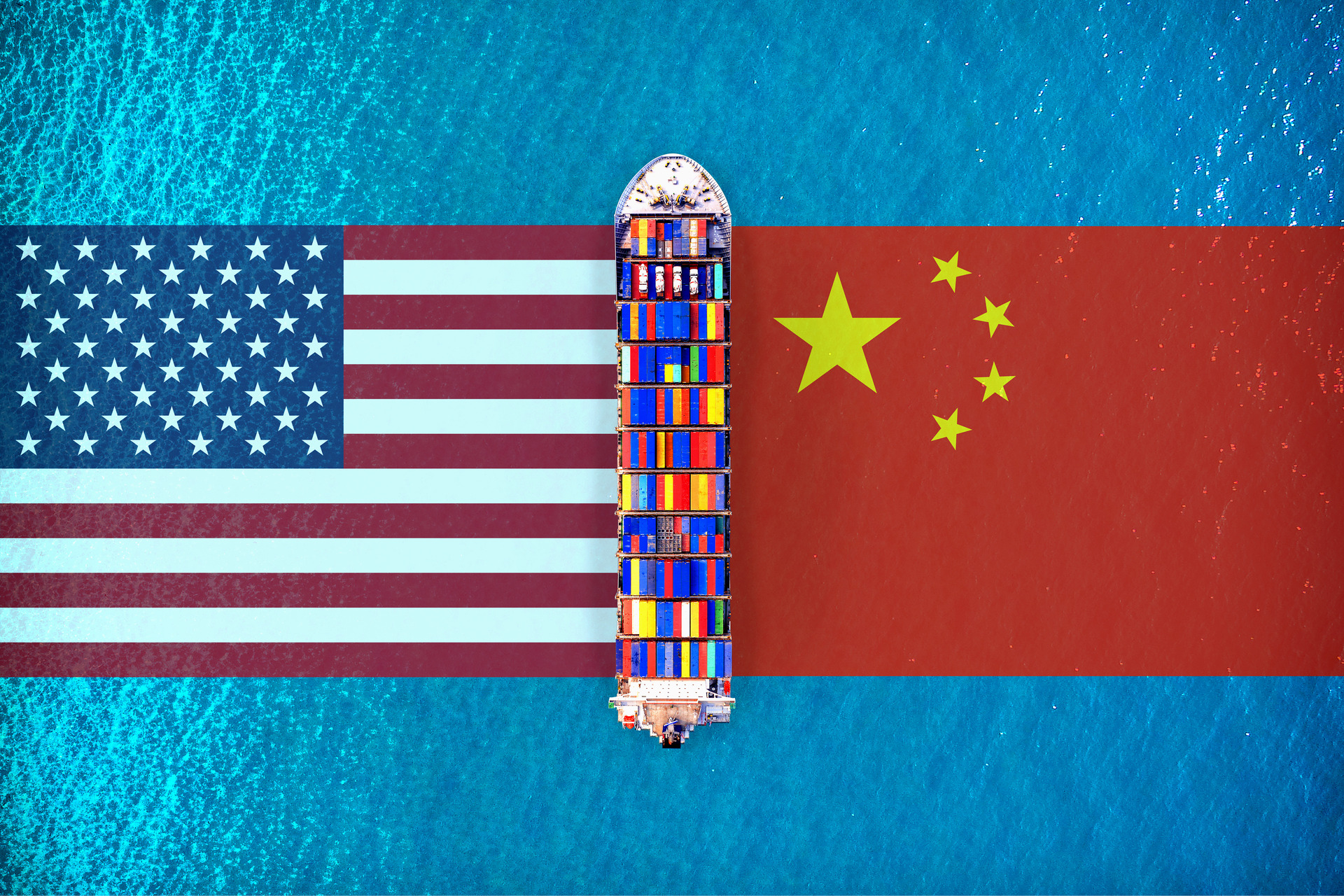America flags and chinese flags with Cargo ship on ocean. USA and China trade war.