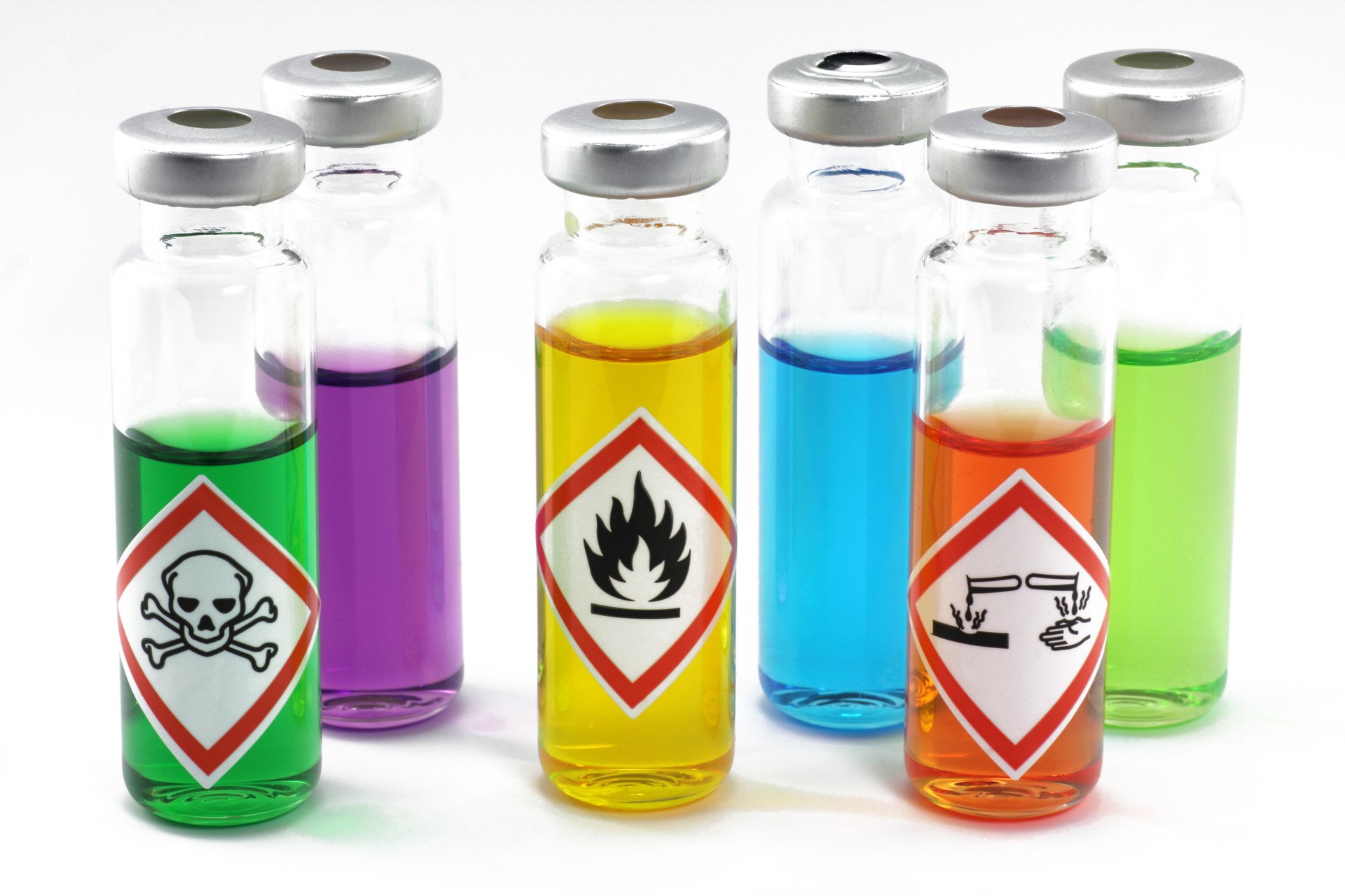Coloured chemicals in small containers