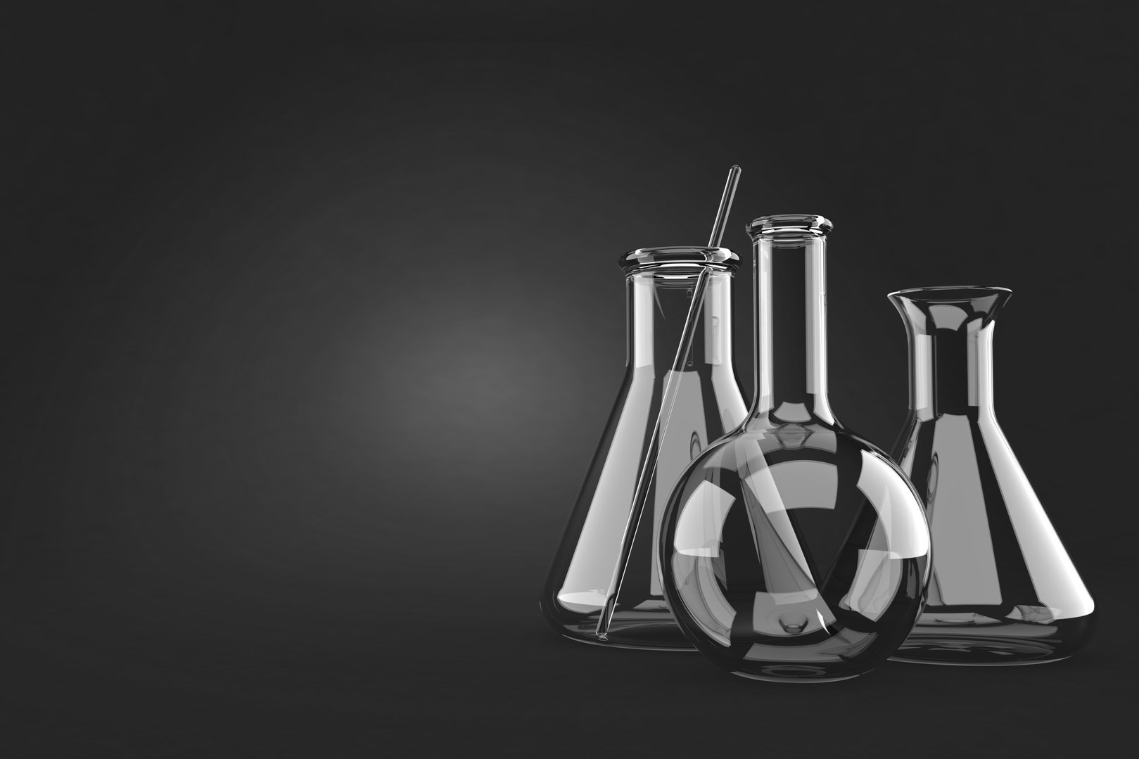 Chemie-Kolben auf grauem Hintergrund