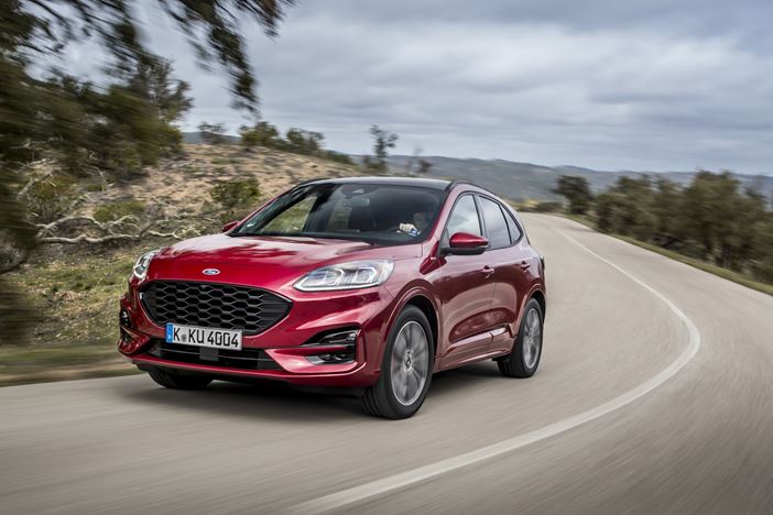 Ford Kuga driving on road