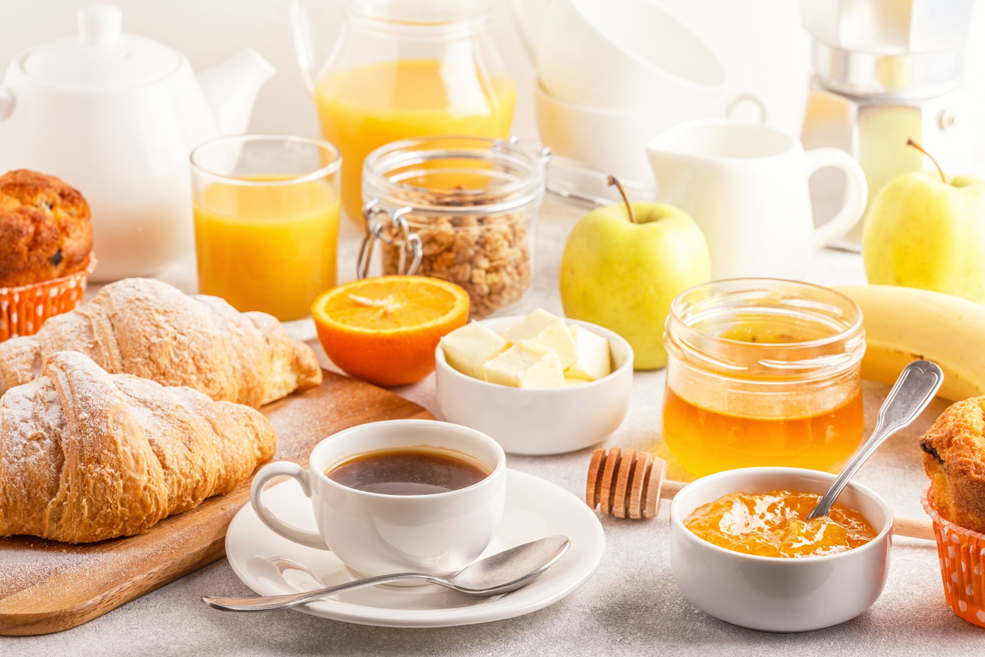 Continental breakfast with fresh croissants, orange juice and coffee