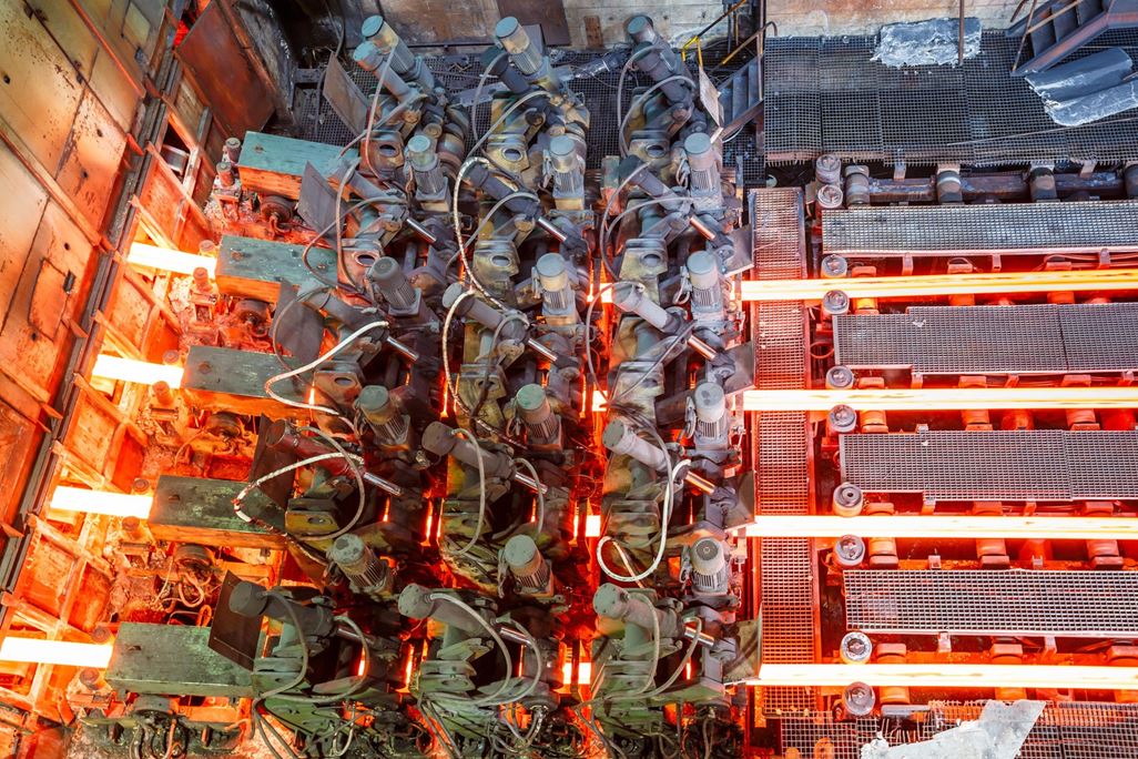Hot steel on conveyor in steel plan