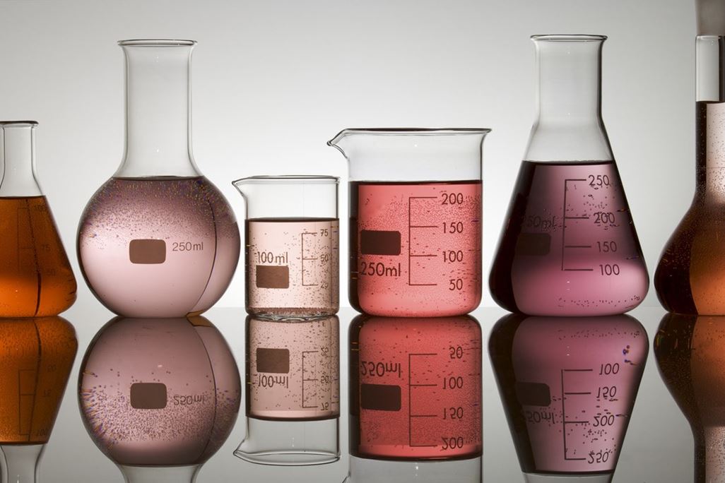 laboratory glass at backlit with white background