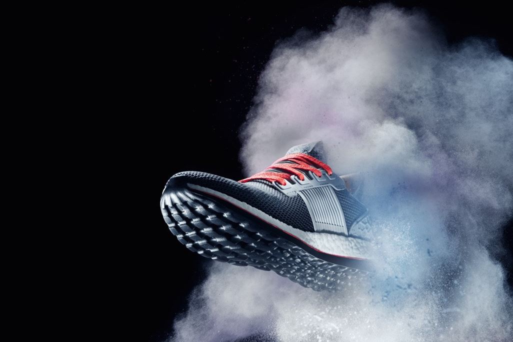 Sneaker flies out of a cloud of dust