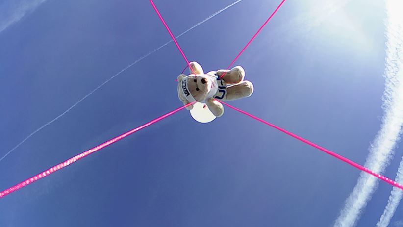 The Heisenbär in LANXESS accessories, that the students have sent to the startosphere among the balloon as an act of gratitude towards LANXESS for financing this project., on his way into the stratosphere.