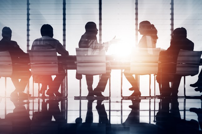 Group of Business People Meeting Back Lit Concept