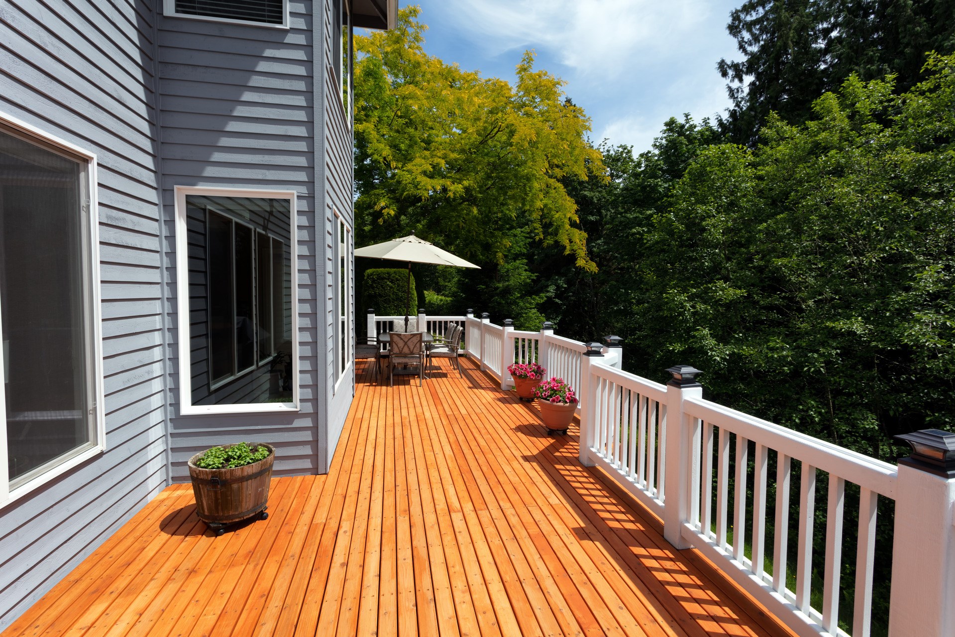 Brand new red cedar outdoor wooden patio during nice day
