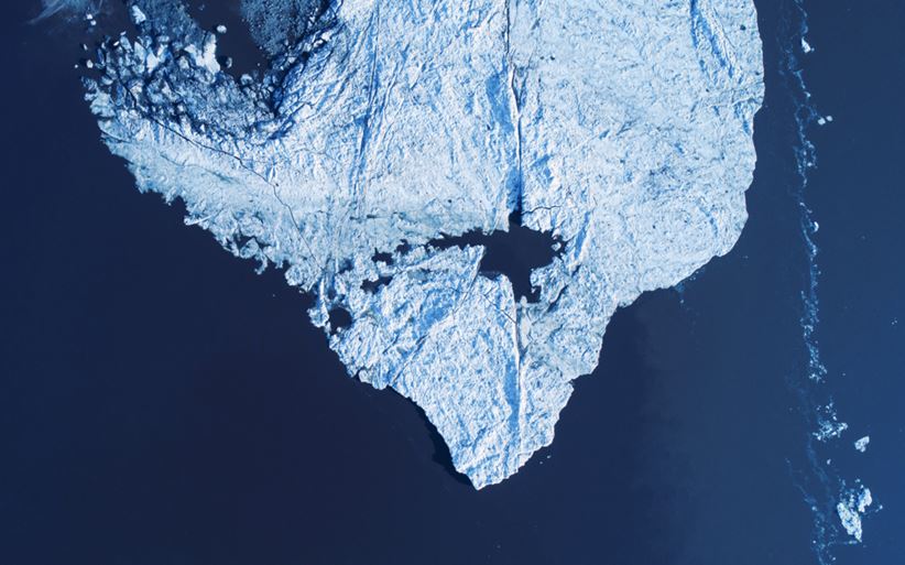 Melting ice cap from above, drone photography, global warming concept