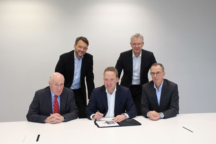 Signing of the “Xact Beliefs & Principles” in 2017.