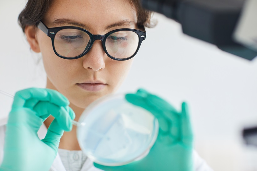 Beautiful Young Woman Working in Laboratory