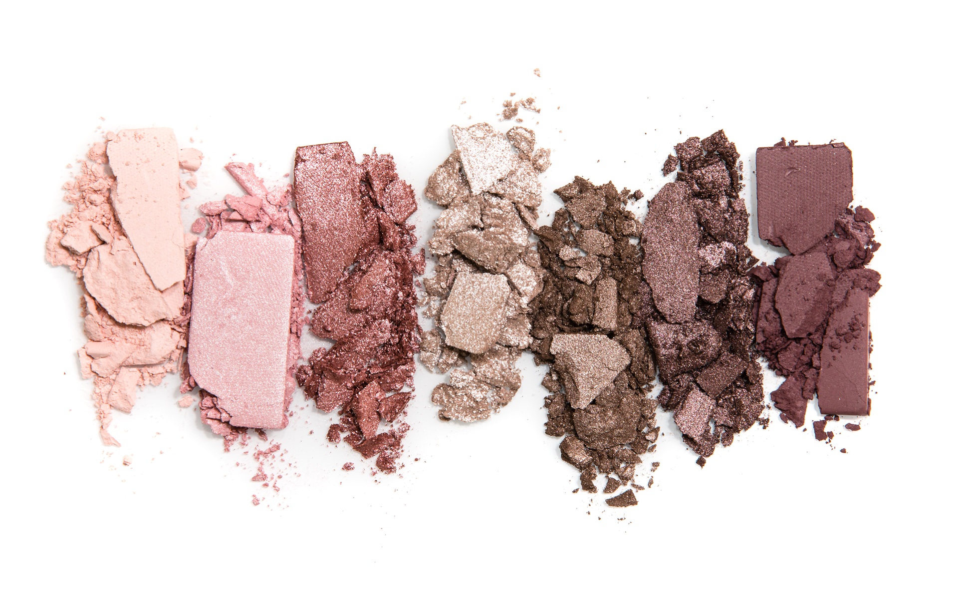 Smashed, neutral toned eyeshadow make up palette isolated on white background