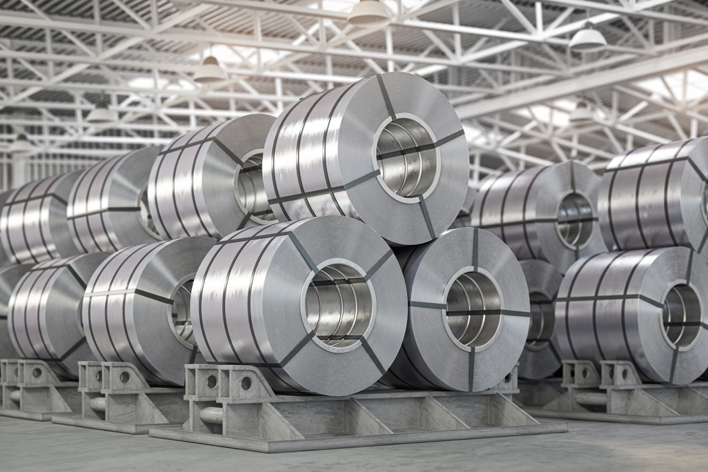 Rolls of metal sheet. Zinc, aluminium or steel sheet rolls on warehouse in factory.